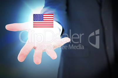 Composite image of mid section of a businessman with hands on a