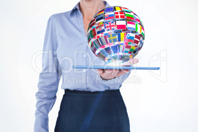 Composite image of businesswoman holding digital tablet