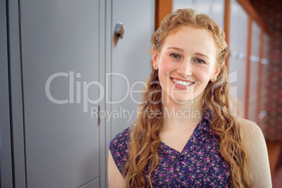 Composite image of portrait of beautiful college student smiling