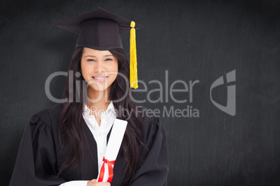 Composite image of a smiling woman looking at the camera while d