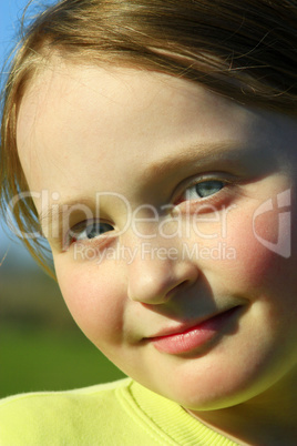 portrait of little beautiful girl with blue eyes