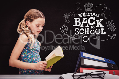 Composite image of girl reading book in library