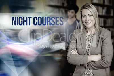 Night courses against professor looking at camera with arms fold