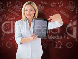 Composite image of mature student showing tablet pc