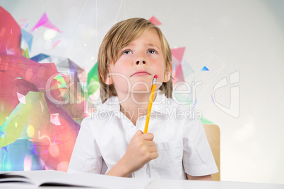 Composite image of cute pupil thinking