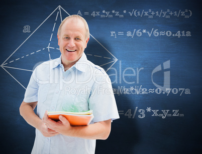 Composite image of mature student holding notebooks