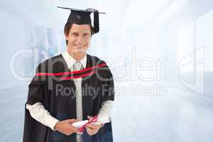 Composite image of man graduating from university