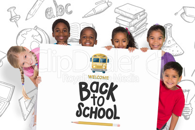 Composite image of elementary pupils showing card