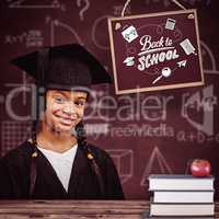 Composite image of cute pupil graduating