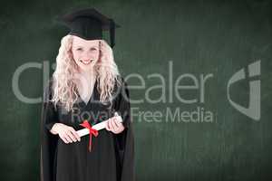 Composite image of teenage girl celebrating graduation