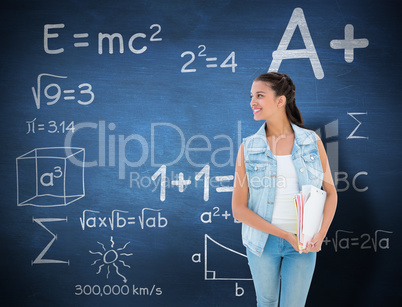 Composite image of student holding notepads