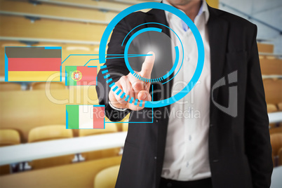 Composite image of businessman standing and pointing