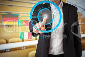 Composite image of businessman standing and pointing