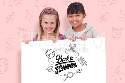 Composite image of girls behind a blank panel