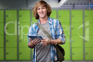 Composite image of student using tablet in library