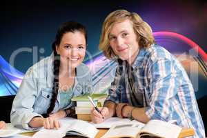 Composite image of college students doing homework in library