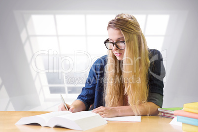 Composite image of student studying in the library