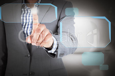 Composite image of focused businessman pointing