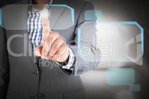 Composite image of focused businessman pointing