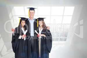Composite image of full length of three friends graduate from co