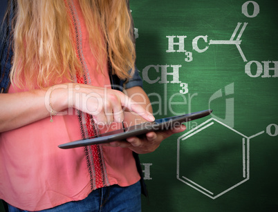 Composite image of student using tablet in library