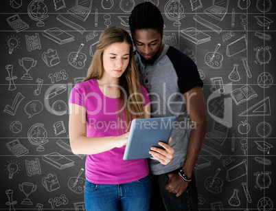 Composite image of creative team looking at digital tablet