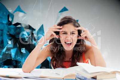 Composite image of student goes crazy doing her homework