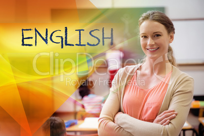 English against pretty teacher smiling at camera at back of clas