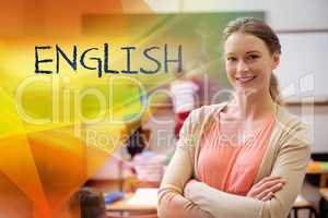 English against pretty teacher smiling at camera at back of clas