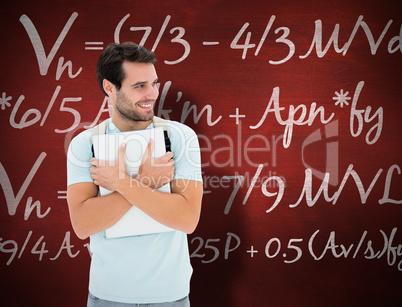 Composite image of student holding laptop