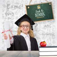 Composite image of schoolgirl with graduation robe and holding h