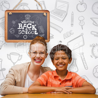 Composite image of happy pupil and teacher