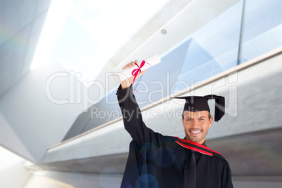 Composite image of happy attractive boy after his graduation