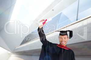 Composite image of happy attractive boy after his graduation