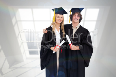 Composite image of two students in graduate robe shoulder to sho