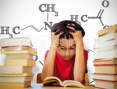 Composite image of tensed boy sitting with stack of books