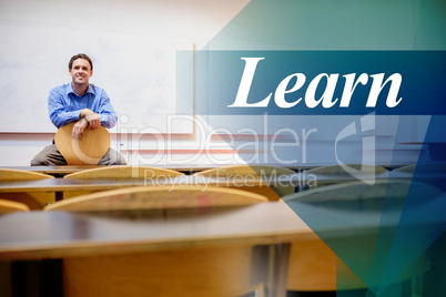 Learn against male teacher sitting on chair in lecture hall