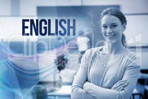 English against pretty teacher smiling at camera at back of clas