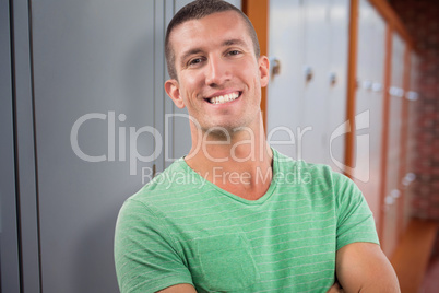 Composite image of casual man smiling at camera