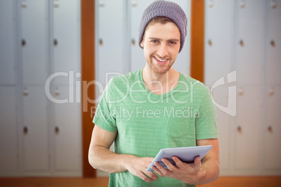 Composite image of student using tablet