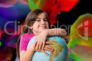 Composite image of cute pupil smiling holding globe
