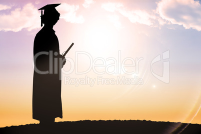 Composite image of silhouette of graduate