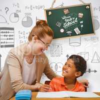 Composite image of teacher helping pupil