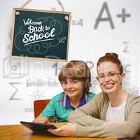 Composite image of happy pupil and teacher