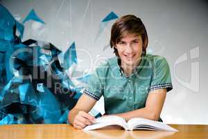 Composite image of student sitting in library reading