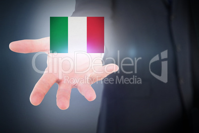 Composite image of mid section of a businessman with hands on a