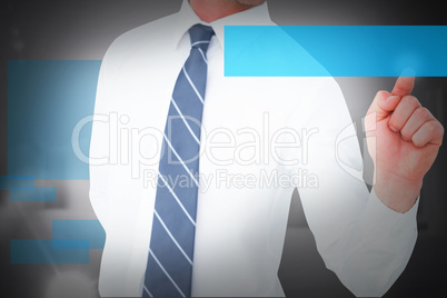 Composite image of businessman pointing with his finger