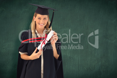 Composite image of woman smiling at her graduation