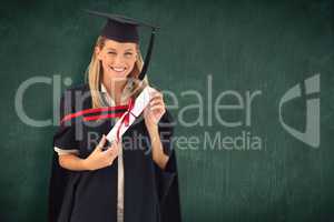 Composite image of woman smiling at her graduation