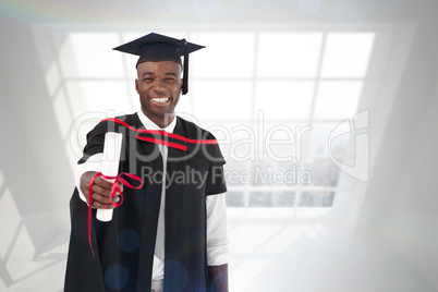 Composite image of man smilling at graduation